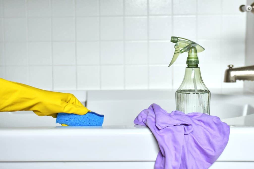 cleaning-a-bathroom-bathtub-and-shower-combination-2022-11-14-04-18-15-utc